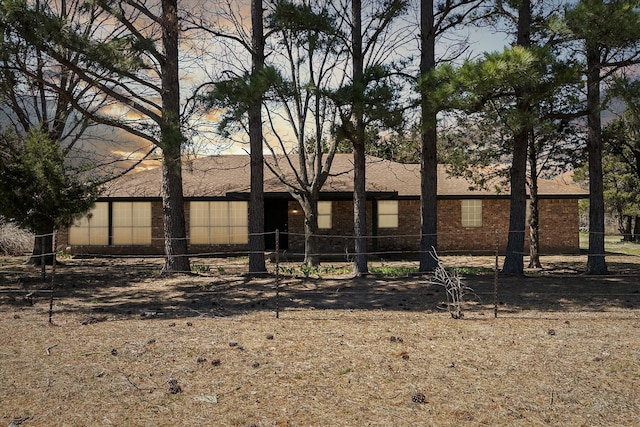 ranch-style home with brick siding