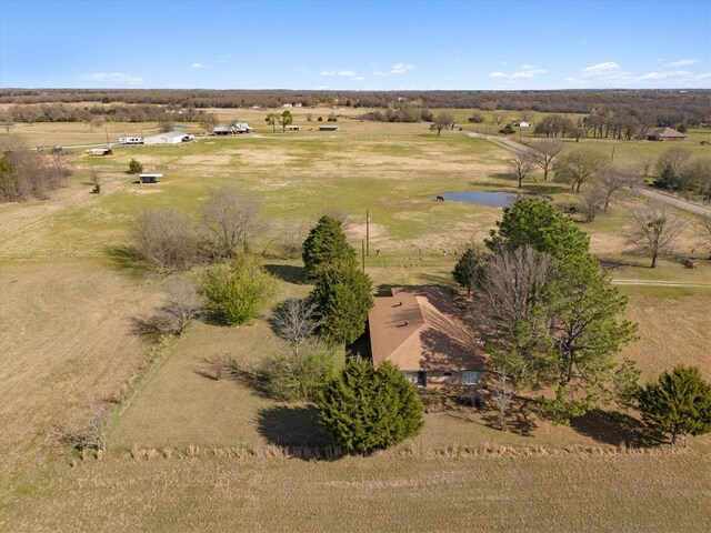 birds eye view of property featuring a rural view