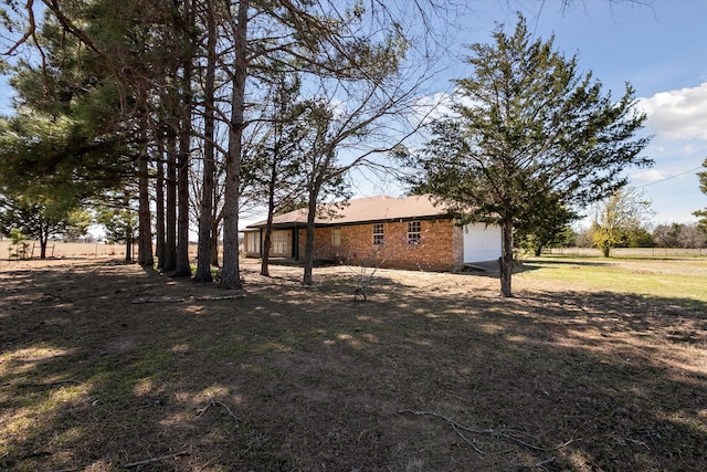 view of yard with an attached garage