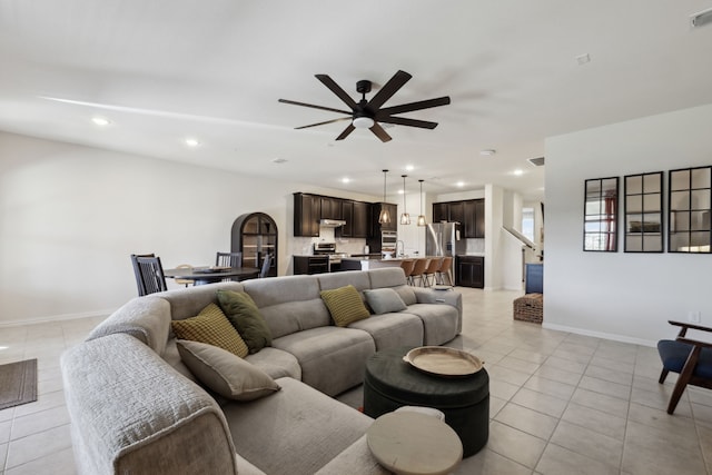 342 Meredith Dr, Fate, TX 75087 - living room featuring light tile patterned floors, a ceiling fan, recessed lighting, and baseboards