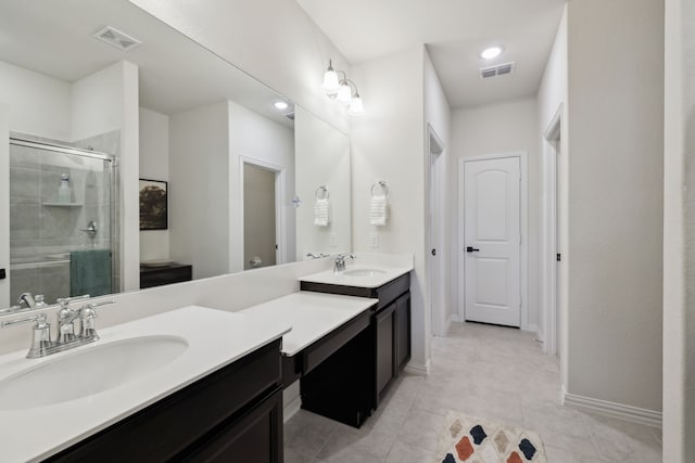 342 Meredith Dr, Fate, TX 75087 - full bathroom featuring double vanity, a shower stall, tile patterned floors, baseboards, and toilet