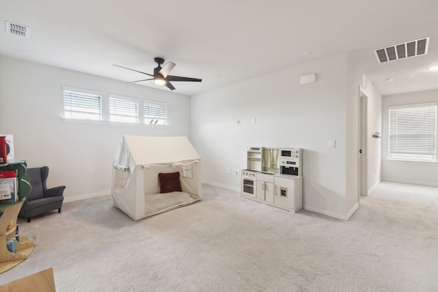 342 Meredith Dr, Fate, TX 75087 - playroom with a ceiling fan, carpet, and baseboards