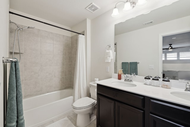 342 Meredith Dr, Fate, TX 75087 - full bathroom featuring double vanity, shower / bathtub combination with curtain, toilet, tile patterned flooring, and a ceiling fan
