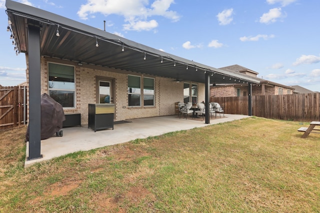 342 Meredith Dr, Fate, TX 75087 - back of house featuring brick siding, a patio, and ceiling fan