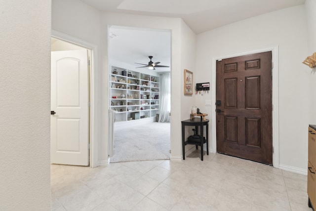 342 Meredith Dr, Fate, TX 75087 - foyer with ceiling fan, baseboards, light carpet, and light tile patterned flooring