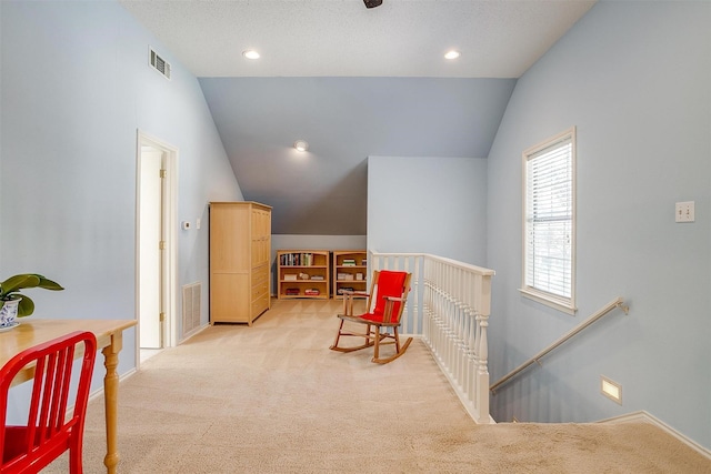 3241 Westcliff Rd W, Fort Worth, TX 76109 - living area featuring an upstairs landing, vaulted ceiling, light colored carpet, recessed lighting, and baseboards