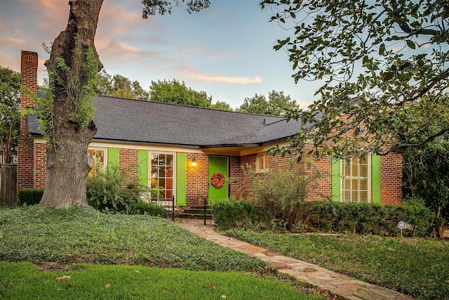 3241 Westcliff Rd W, Fort Worth, TX 76109 - view of front of house featuring brick siding, a chimney, and roof with shingles