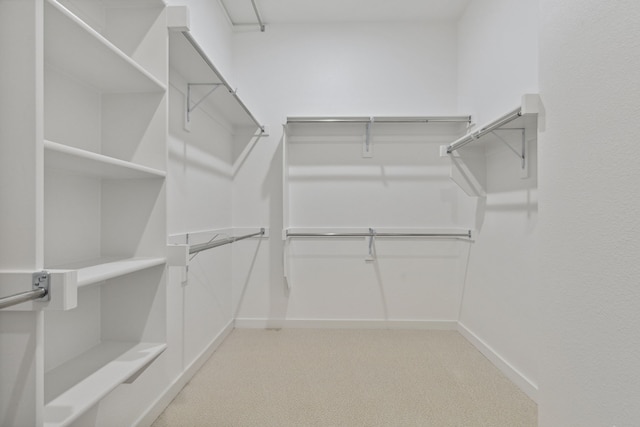 4516 Rustic Ridge Dr, Mckinney, TX 75071 - walk in closet featuring light colored carpet
