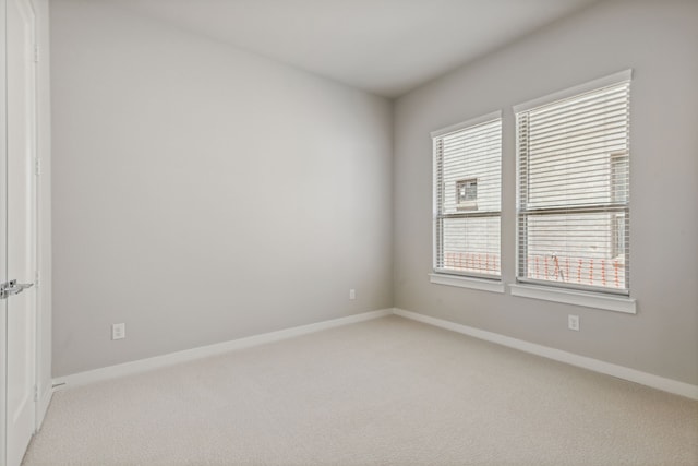 4516 Rustic Ridge Dr, Mckinney, TX 75071 - empty room featuring light carpet and baseboards