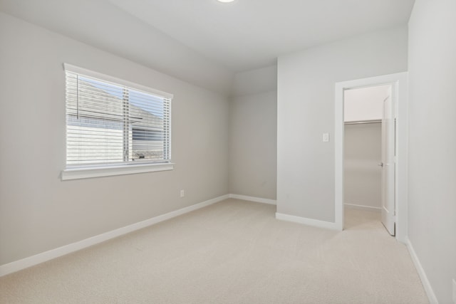 4516 Rustic Ridge Dr, Mckinney, TX 75071 - unfurnished bedroom with light carpet, a spacious closet, and a closet