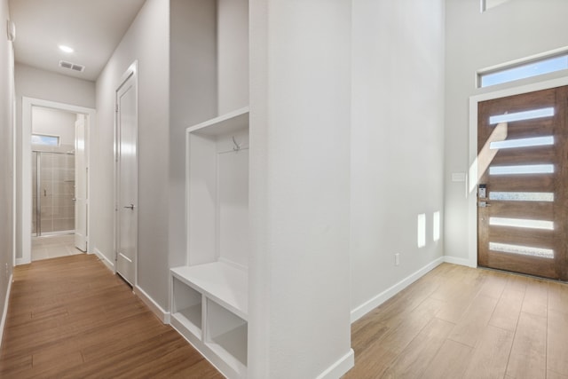 4516 Rustic Ridge Dr, Mckinney, TX 75071 - mudroom featuring wood finished floors