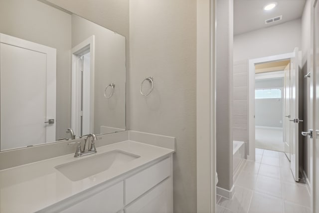 4516 Rustic Ridge Dr, Mckinney, TX 75071 - bathroom featuring vanity and tile patterned floors