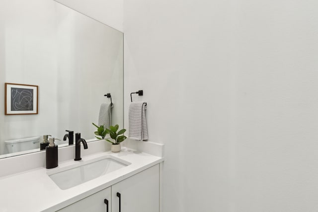 2142 Lovedale Ave Unit 101, Dallas, TX 75235 - bathroom featuring toilet and vanity