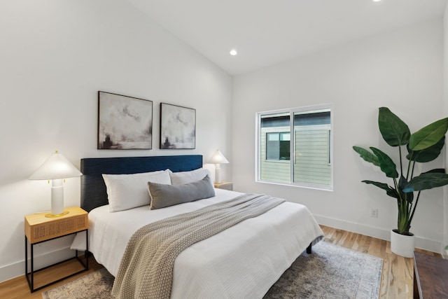 2142 Lovedale Ave Unit 101, Dallas, TX 75235 - bedroom featuring light wood finished floors, baseboards, and recessed lighting