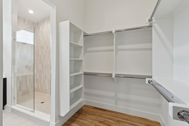 2142 Lovedale Ave Unit 101, Dallas, TX 75235 - walk in closet with wood finished floors