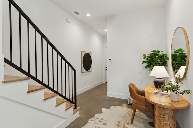 2142 Lovedale Ave Unit 101, Dallas, TX 75235 - foyer with visible vents, baseboards, recessed lighting, concrete floors, and stairs