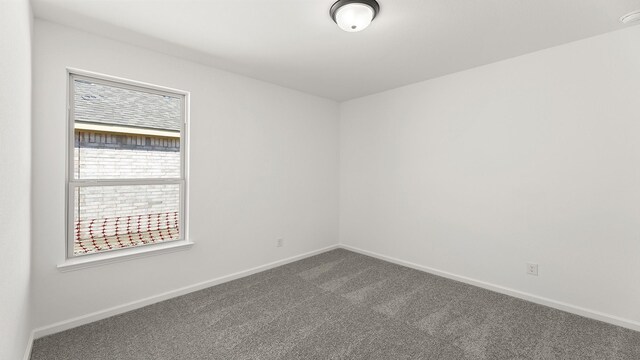 724 Hidden Feather, Lavon, TX 75166 - carpeted spare room featuring baseboards