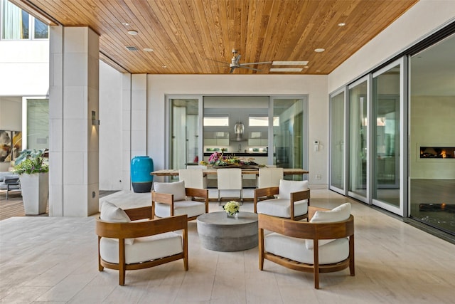 view of patio / terrace with a ceiling fan and an outdoor hangout area