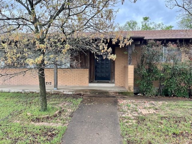 TBA N Oakridge Dr, Hudson Oaks, TX 76087 - property entrance with brick siding