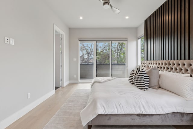 2228 Wycliff Ave, Dallas, TX 75219 - bedroom featuring baseboards, access to outside, recessed lighting, and light wood-type flooring