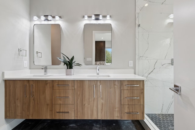 2228 Wycliff Ave, Dallas, TX 75219 - bathroom featuring double vanity, a sink, and a marble finish shower