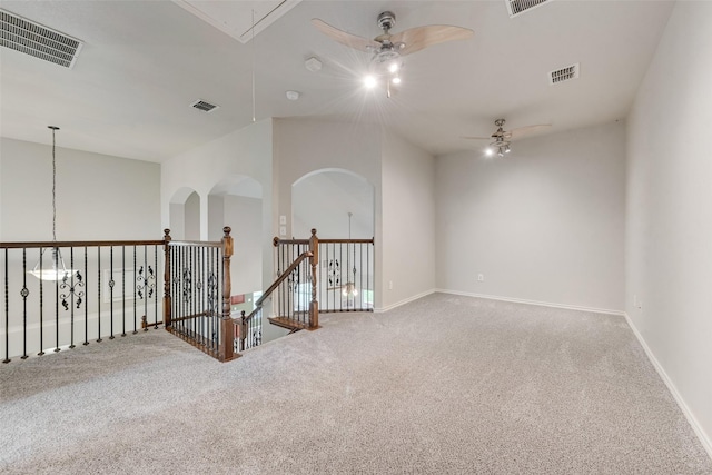 119 Valen Dr, Fate, TX 75189 - empty room with attic access, visible vents, carpet floors, and a ceiling fan
