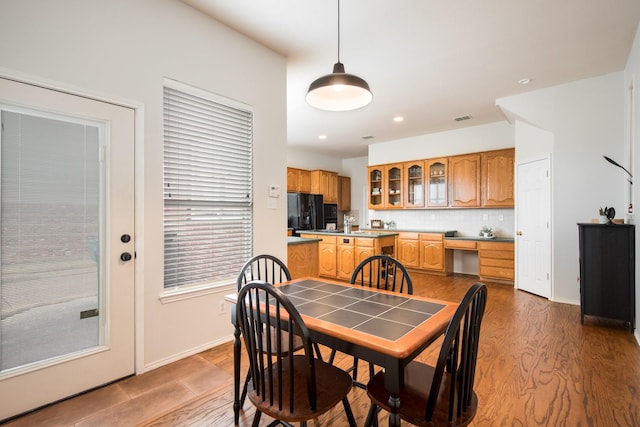 104 Cambridge Ct, Heath, TX 75032 - dining space with wood finished floors, baseboards, and recessed lighting