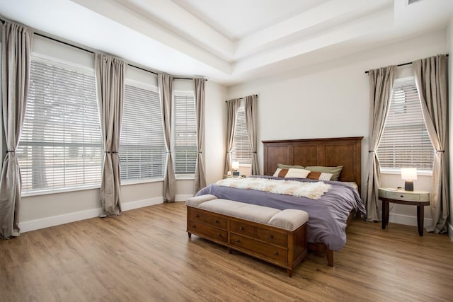 104 Cambridge Ct, Heath, TX 75032 - bedroom featuring baseboards, multiple windows, and wood finished floors