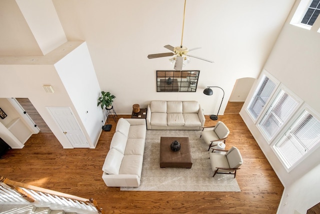 104 Cambridge Ct, Heath, TX 75032 - living area featuring a towering ceiling, wood finished floors, and healthy amount of natural light