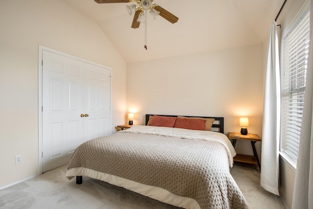104 Cambridge Ct, Heath, TX 75032 - bedroom featuring light carpet, multiple windows, vaulted ceiling, and ceiling fan