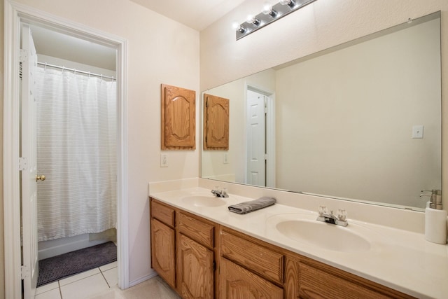 104 Cambridge Ct, Heath, TX 75032 - bathroom featuring double vanity, tile patterned floors, and curtained shower