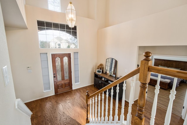 104 Cambridge Ct, Heath, TX 75032 - entrance foyer featuring a high ceiling, wood finished floors, and a chandelier