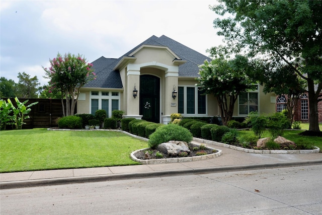 2937 Lago Vista Ln, Rockwall, TX 75032 - view of front of house featuring stucco siding and roof with shingles
