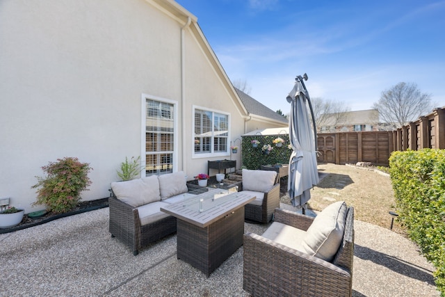 2937 Lago Vista Ln, Rockwall, TX 75032 - fenced backyard with an outdoor living space and a patio
