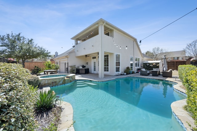 2937 Lago Vista Ln, Rockwall, TX 75032 - view of pool featuring a ceiling fan, an outdoor living space, a fenced backyard, and a patio