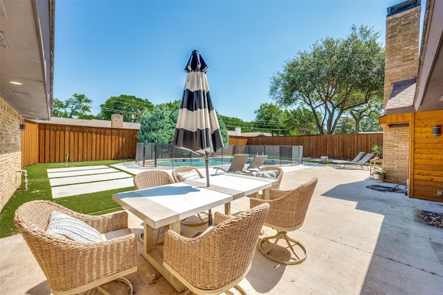 4055 Fawnhollow Dr, Dallas, TX 75244 - fenced backyard with outdoor dining area and a patio area