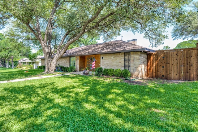 4055 Fawnhollow Dr, Dallas, TX 75244 - view of front of home featuring a chimney and brick siding