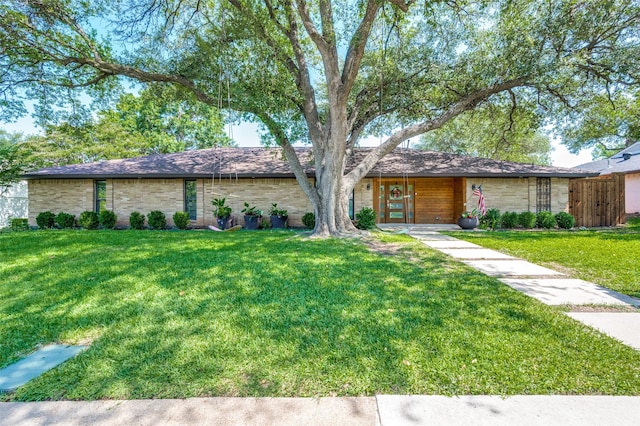 4055 Fawnhollow Dr, Dallas, TX 75244 - mid-century home featuring a front yard
