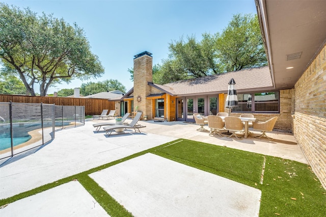4055 Fawnhollow Dr, Dallas, TX 75244 - fenced backyard featuring a patio