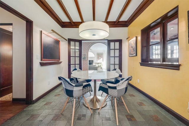 6722 Lakewood Blvd, Dallas, TX 75214 - dining room with french doors, stone tile flooring, beam ceiling, and baseboards