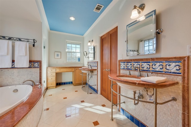6722 Lakewood Blvd, Dallas, TX 75214 - bathroom featuring a bathing tub, tile patterned flooring, ornamental molding, and visible vents