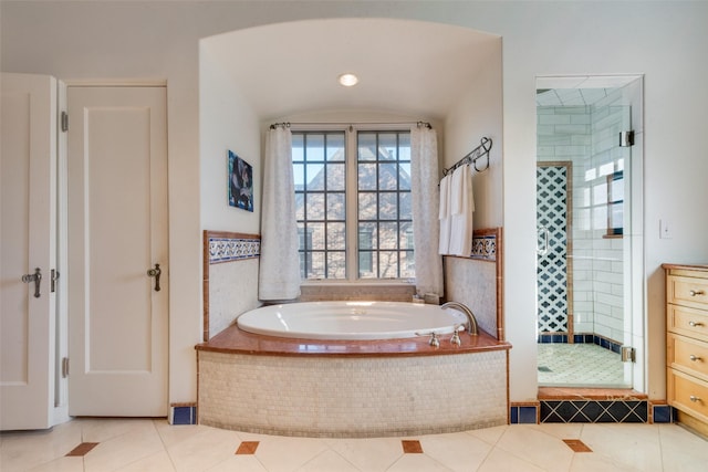 6722 Lakewood Blvd, Dallas, TX 75214 - bathroom featuring a garden tub, a stall shower, and tile patterned flooring