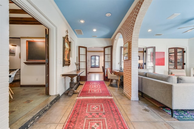 6722 Lakewood Blvd, Dallas, TX 75214 - hall with visible vents, baseboards, ornamental molding, tile patterned floors, and recessed lighting