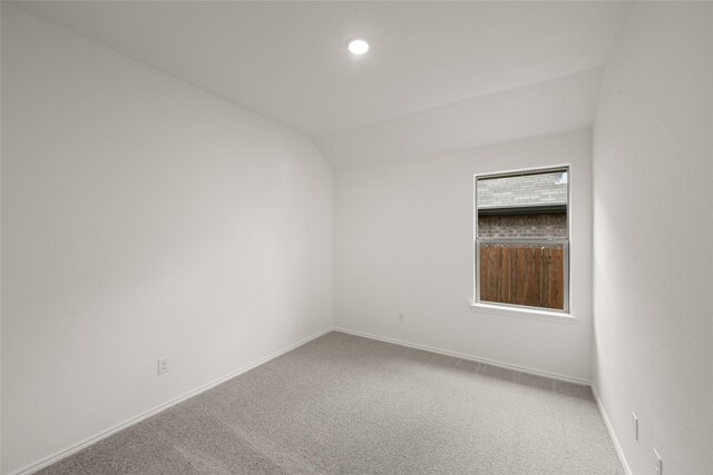 919 Madeline Ln, Cleburne, TX 76033 - bathroom featuring toilet, bathing tub / shower combination, vanity, and vaulted ceiling