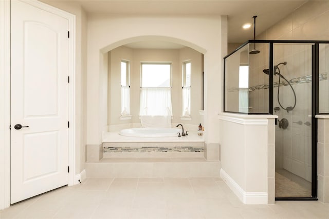 1413 Artesia Ln, Mclendon Chisholm, TX 75032 - full bath with tile patterned floors, recessed lighting, baseboards, a shower stall, and a garden tub