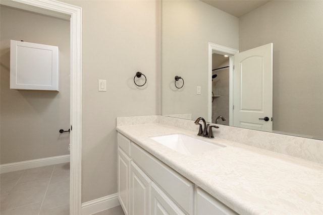 1413 Artesia Ln, Mclendon Chisholm, TX 75032 - bathroom with vanity, baseboards, and tile patterned floors