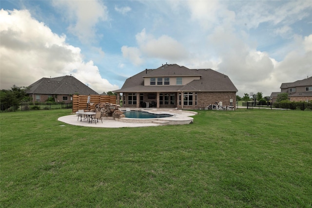 1413 Artesia Ln, Mclendon Chisholm, TX 75032 - back of property with a patio, a fenced backyard, a yard, and a fenced in pool