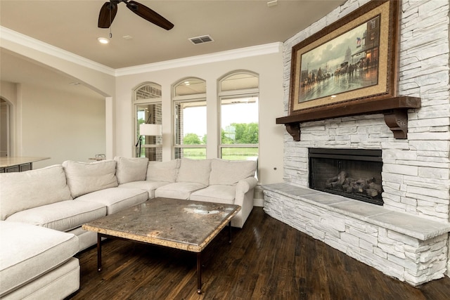 1413 Artesia Ln, Mclendon Chisholm, TX 75032 - living room with a fireplace, arched walkways, a ceiling fan, ornamental molding, and hardwood / wood-style flooring