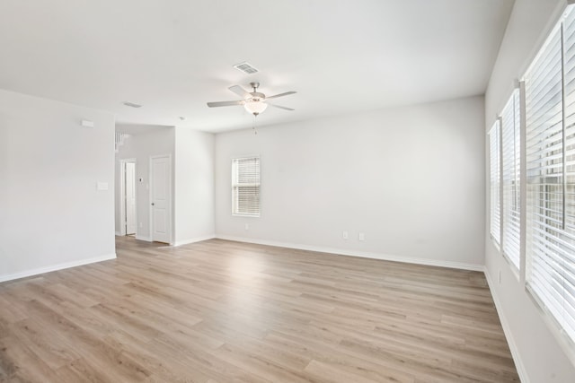 3910 Walmer Way, Princeton, TX 75071 - unfurnished room with plenty of natural light, ceiling fan, light wood-style flooring, and baseboards