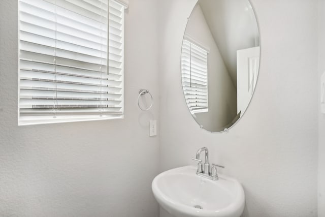 3910 Walmer Way, Princeton, TX 75071 - bathroom featuring a sink and healthy amount of natural light